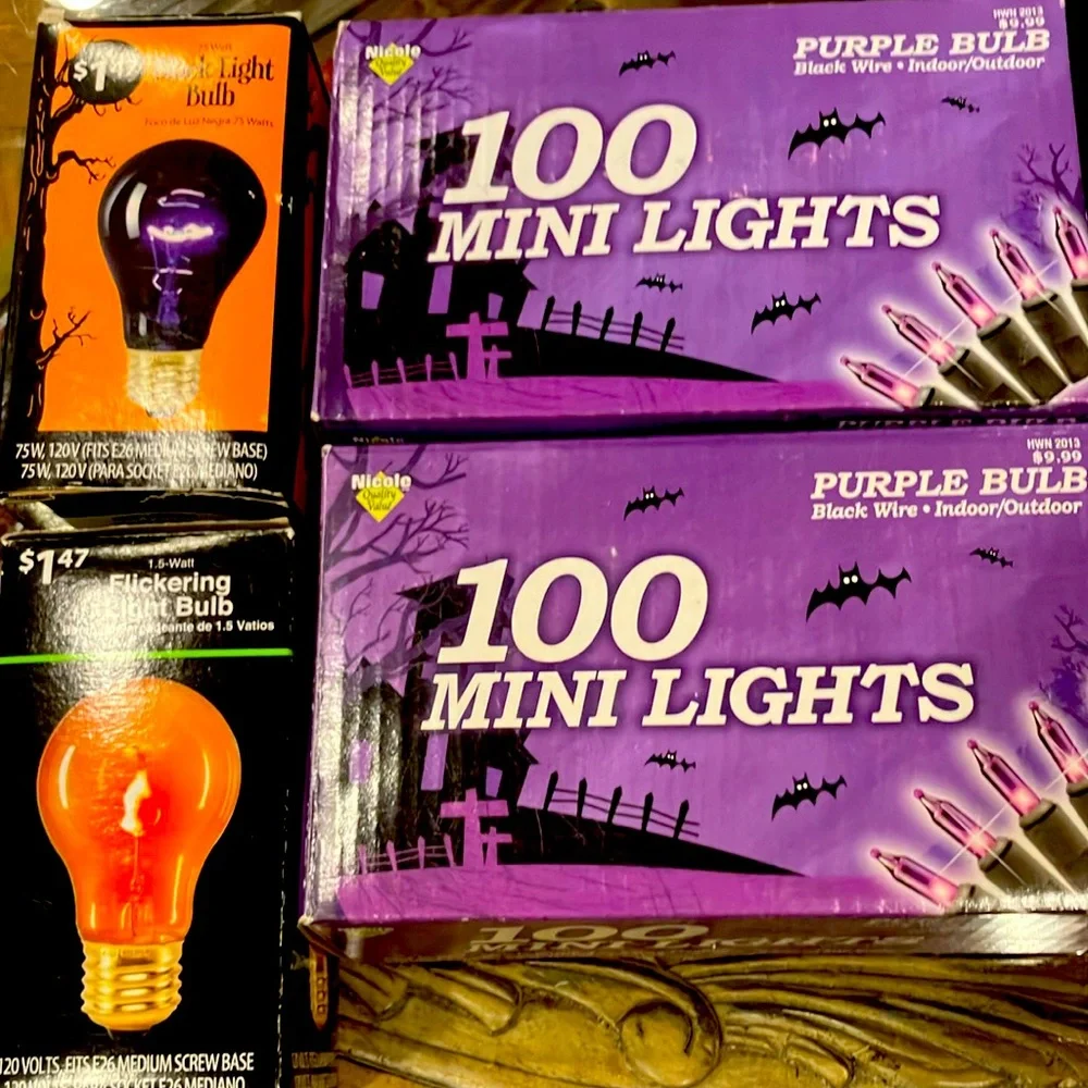 2 boxes of Purple Mini Lights with Black Wire & 2 single bulbs, 1 blk, 1orange